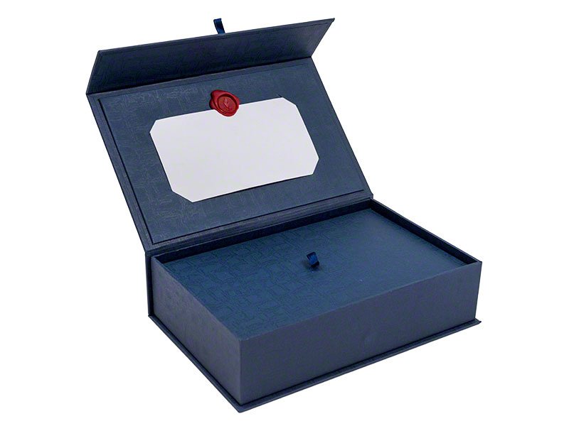 4_PETRIBUTES_CASKET_FINDON_BLUE_WAX-SEAL_FIN.jpg Beautiful eco cardboard casket ashes urn. Pet urns for dog, cat or horse keepsake and memorials.