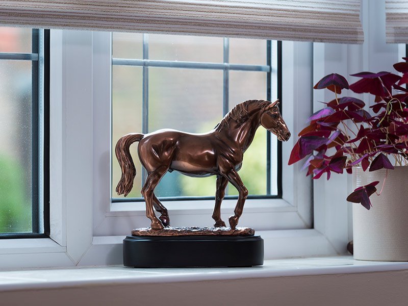 PETRIBUTES_CHAMPION Our lovely figurine ashes keepsake urns are so discreet and look lovely in any setting. Sculptured ornamental ashes urns caskets for pets.